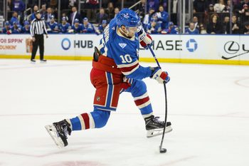 Dec 13, 2025; New York, New York, USA;  New York Rangers left wing Artemi Panarin (10) attempts a shot on goal in overtime against the Montréal Canadiens at Madison Square Garden. Mandatory Credit: Wendell Cruz-Imagn Images