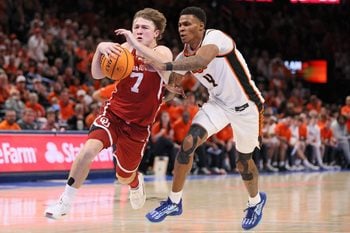 Oklahoma guard Dayton Forsythe (7) drives against Oklahoma State forward Christian Coleman (4) during the second half of a Bedlam men's college basketball game between the OSU Cowboys and OU Sooners at Paycom Center in Oklahoma City, Saturday, Dec. 13, 2025.