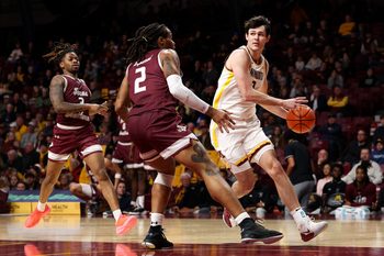 Dec 14, 2025; Minneapolis, Minnesota, USA; Minnesota Golden Gophers forward Bobby Durkin (3) works around Texas Southern Tigers forward Troy Hupstead (2) during the first half at Williams Arena. Mandatory Credit: Matt Krohn-Imagn Images