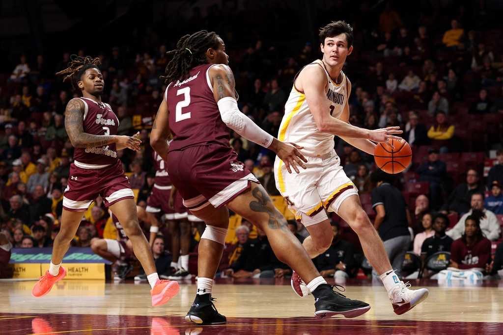 Dec 14, 2025; Minneapolis, Minnesota, USA; Minnesota Golden Gophers forward Bobby Durkin (3) works around Texas Southern Tigers forward Troy Hupstead (2) during the first half at Williams Arena. Mandatory Credit: Matt Krohn-Imagn Images