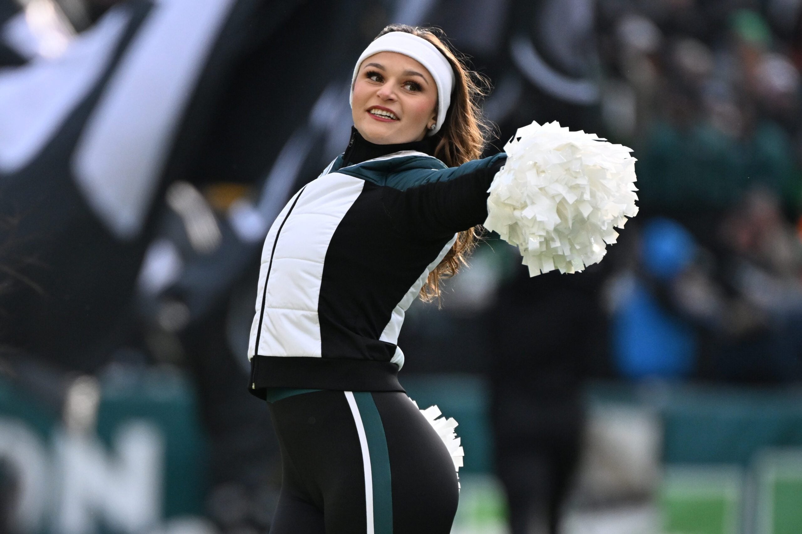 Dec 14, 2025; Philadelphia, Pennsylvania, USA; A Philadelphia Eagles cheerleader performs during halftime against the Las Vegas Raiders at Lincoln Financial Field. Mandatory Credit: Eric Hartline-Imagn Images