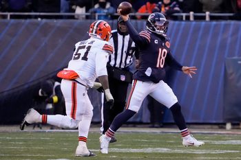 Dec 14, 2025; Chicago, Illinois, USA; Chicago Bears quarterback Caleb Williams (18) throws a pass against Cleveland Browns defensive tackle Mike Hall Jr. (51) during the third quarter at Soldier Field. Mandatory Credit: David Banks-Imagn Images