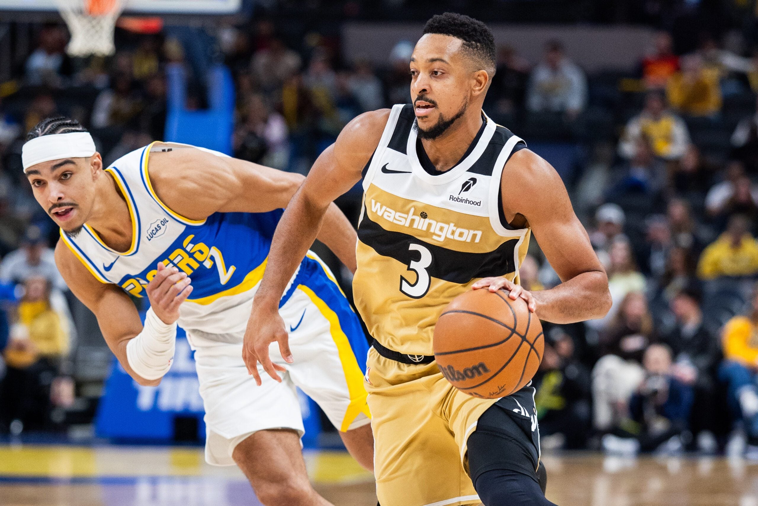 Dec 14, 2025; Indianapolis, Indiana, USA;  Washington Wizards guard CJ McCollum (3) dribbles the ball while Indiana Pacers guard/forward Andrew Nembhard (2) defends in the second half at Gainbridge Fieldhouse. Mandatory Credit: Trevor Ruszkowski-Imagn Images