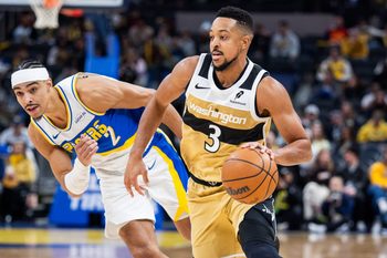 Dec 14, 2025; Indianapolis, Indiana, USA;  Washington Wizards guard CJ McCollum (3) dribbles the ball while Indiana Pacers guard/forward Andrew Nembhard (2) defends in the second half at Gainbridge Fieldhouse. Mandatory Credit: Trevor Ruszkowski-Imagn Images