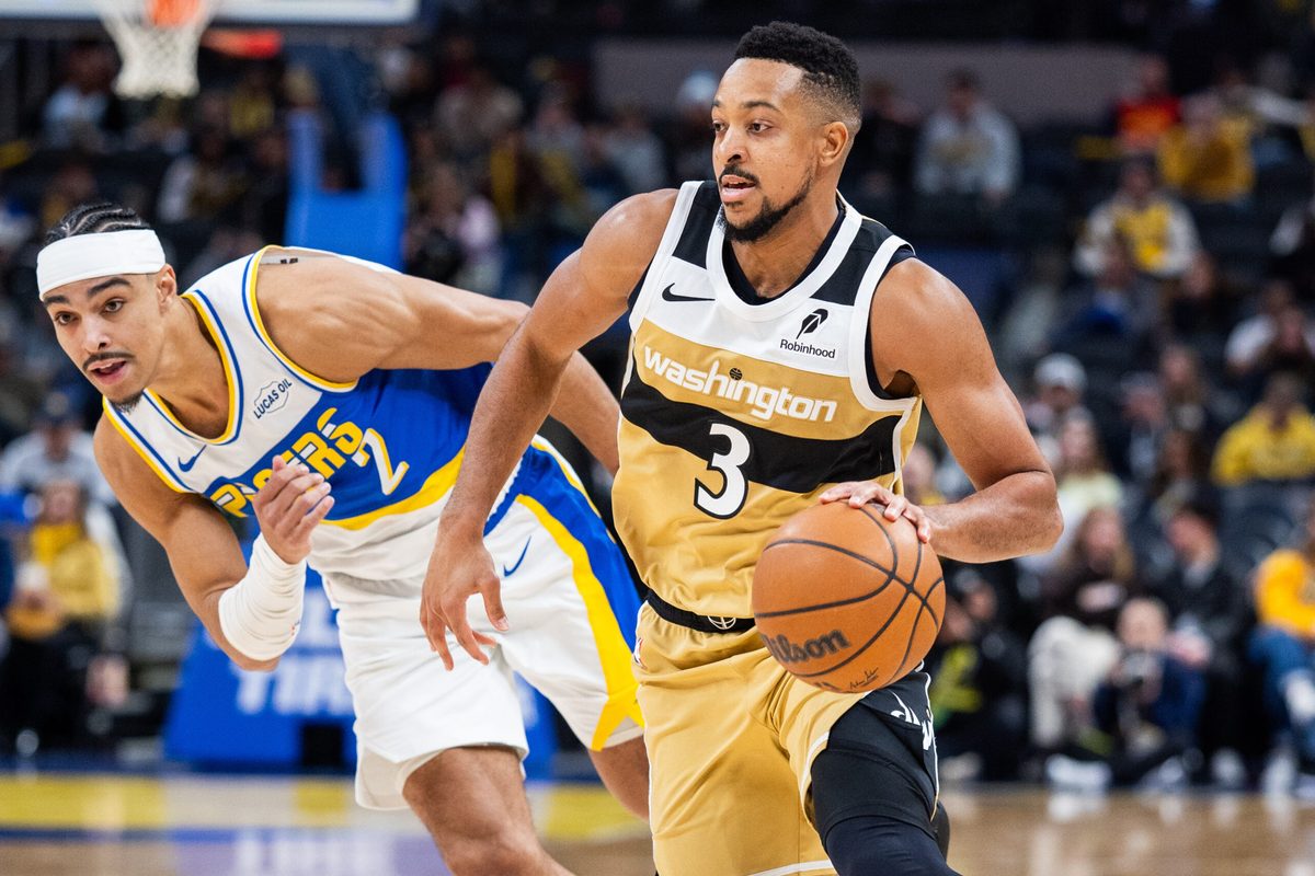 Dec 14, 2025; Indianapolis, Indiana, USA; Washington Wizards guard CJ McCollum (3) dribbles the ball while Indiana Pacers guard/forward Andrew Nembhard (2) defends in the second half at Gainbridge Fieldhouse. Mandatory Credit: Trevor Ruszkowski-Imagn Images