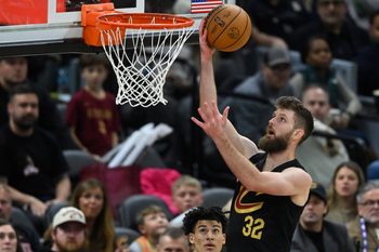 Dec 14, 2025; Cleveland, Ohio, USA; Cleveland Cavaliers forward Dean Wade (32) drives to the basket in the fourth quarter against the Charlotte Hornets at Rocket Arena. Mandatory Credit: David Richard-Imagn Images