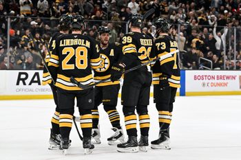 Dec 16, 2025; Boston, Massachusetts, USA; Boston Bruins center Morgan Geekie (39) celebrates his goal that was assisted by right wing David Pastrnak (88) during the first period against the Utah Mammoth at TD Garden. Mandatory Credit: Eric Canha-Imagn Images