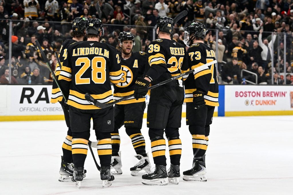 Dec 16, 2025; Boston, Massachusetts, USA; Boston Bruins center Morgan Geekie (39) celebrates his goal that was assisted by right wing David Pastrnak (88) during the first period against the Utah Mammoth at TD Garden. Mandatory Credit: Eric Canha-Imagn Images