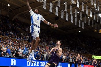 Dec 16, 2025; Durham, North Carolina, USA; Duke Blue Devils forward Isaiah Evans (3) dunks during the second half against the Lipscomb Bisons at Cameron Indoor Stadium. The Blue Devils won 97-73.  Mandatory Credit: Rob Kinnan-Imagn Images