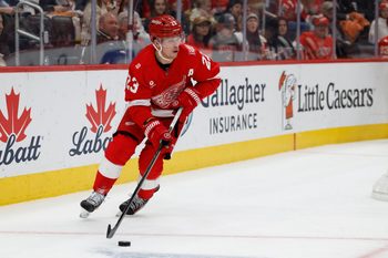 Dec 16, 2025; Detroit, Michigan, USA;  Detroit Red Wings left wing Lucas Raymond (23) skates with the puck in the second period against the New York Islanders at Little Caesars Arena. Mandatory Credit: Rick Osentoski-Imagn Images
