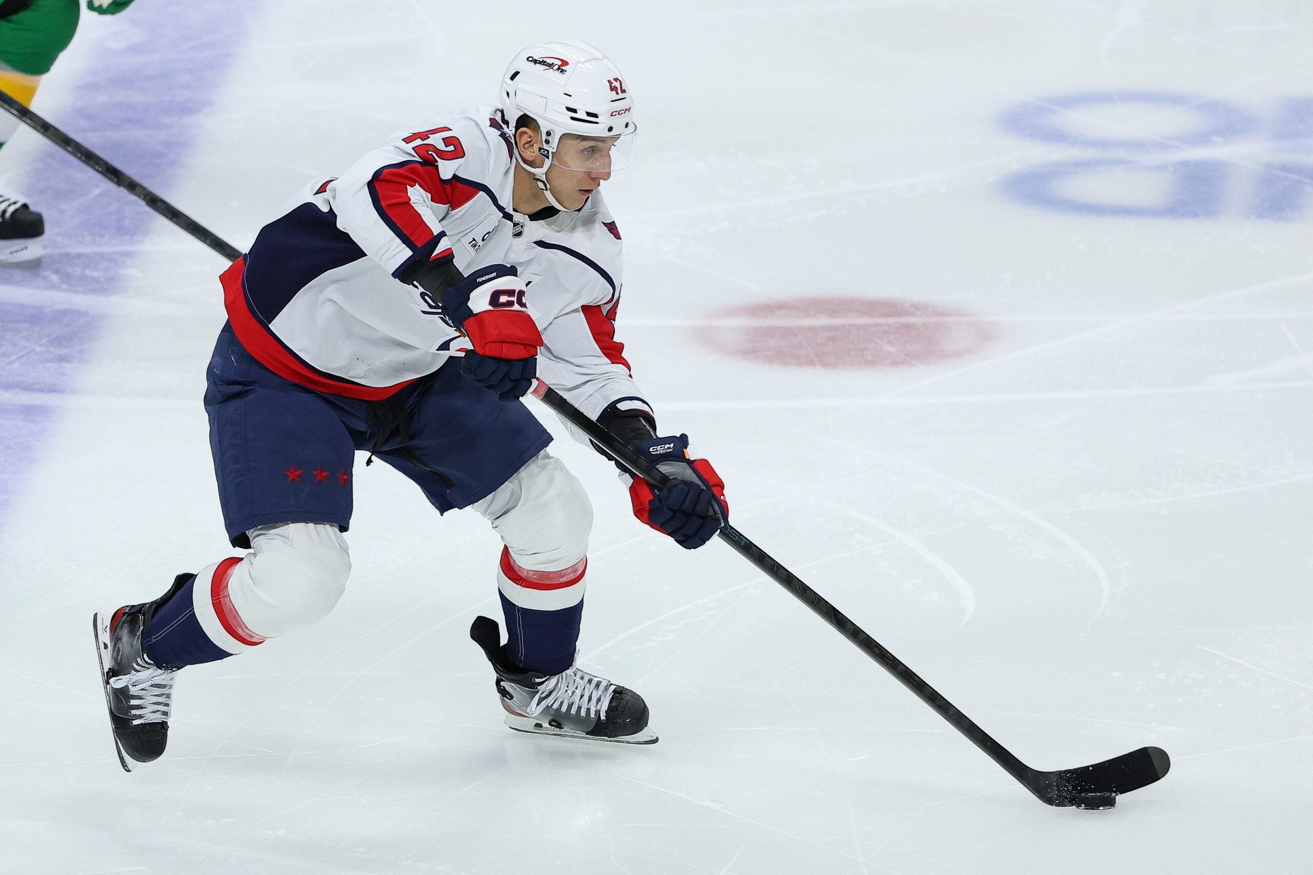Dec 16, 2025; Saint Paul, Minnesota, USA; Washington Capitals defenseman Martin Fehérváry (42) skates with the puck against the Minnesota Wild during the second period at Grand Casino Arena. Mandatory Credit: Matt Krohn-Imagn Images