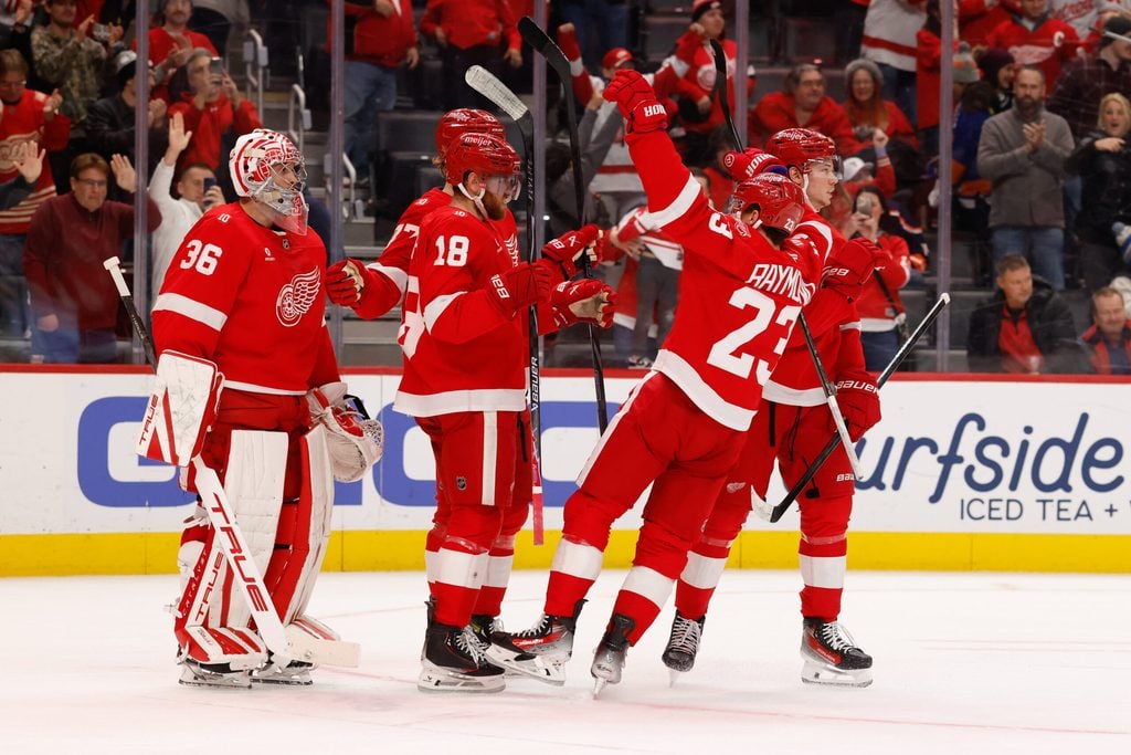 Dec 16, 2025; Detroit, Michigan, USA; Detroit Red Wings right wing Alex Debrincat (93) celebrates after defeating the New York Islanders at Little Caesars Arena. Mandatory Credit: Rick Osentoski-Imagn Images