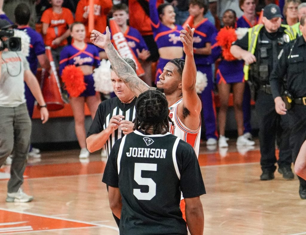 Clemson guard Dillon Hunter (2) celebrates near South Carolina guard Meechie Johnson (5) during the second half at Littlejohn Coliseum in Clemson, S.C. Tuesday, Dec 16, 2025.