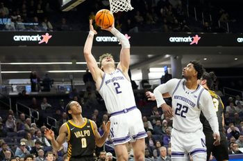 Dec 16, 2025; Evanston, Illinois, USA; Valparaiso Beacons guard Rakim Chaney (0) defends Northwestern Wildcats forward Nick Martinelli (2) during the second half at Welsh-Ryan Arena. Mandatory Credit: David Banks-Imagn Images