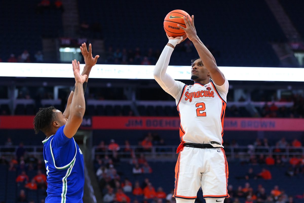 Dec 17, 2025; Syracuse, New York, USA; Syracuse Orange guard J.J. Starling (2) shoots against Mercyhurst Lakers guard Bernie Blunt (4) during the second half at the JMA Wireless Dome. Mandatory Credit: Rich Barnes-Imagn Images