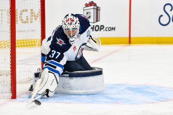 Dec 17, 2025; St. Louis, Missouri, USA; Winnipeg Jets goaltender Connor Hellebuyck (37) defends the net against the St. Louis Blues during the second period at Enterprise Center. Mandatory Credit: Jeff Curry-Imagn Images