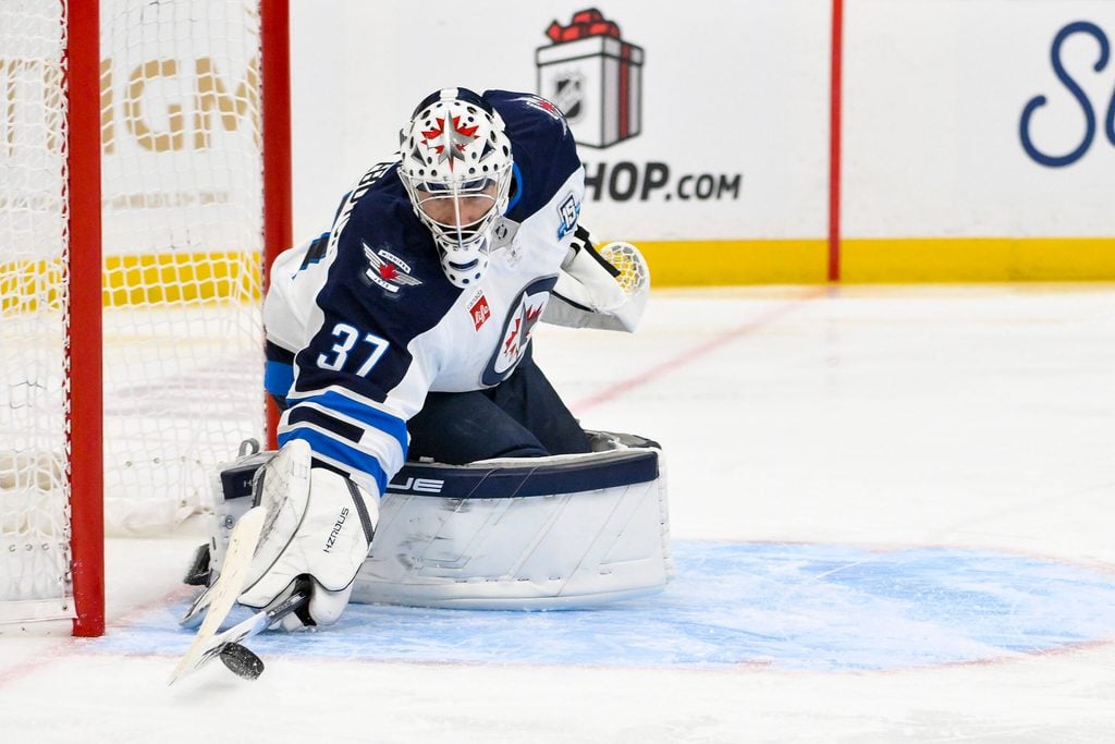 Dec 17, 2025; St. Louis, Missouri, USA; Winnipeg Jets goaltender Connor Hellebuyck (37) defends the net against the St. Louis Blues during the second period at Enterprise Center. Mandatory Credit: Jeff Curry-Imagn Images