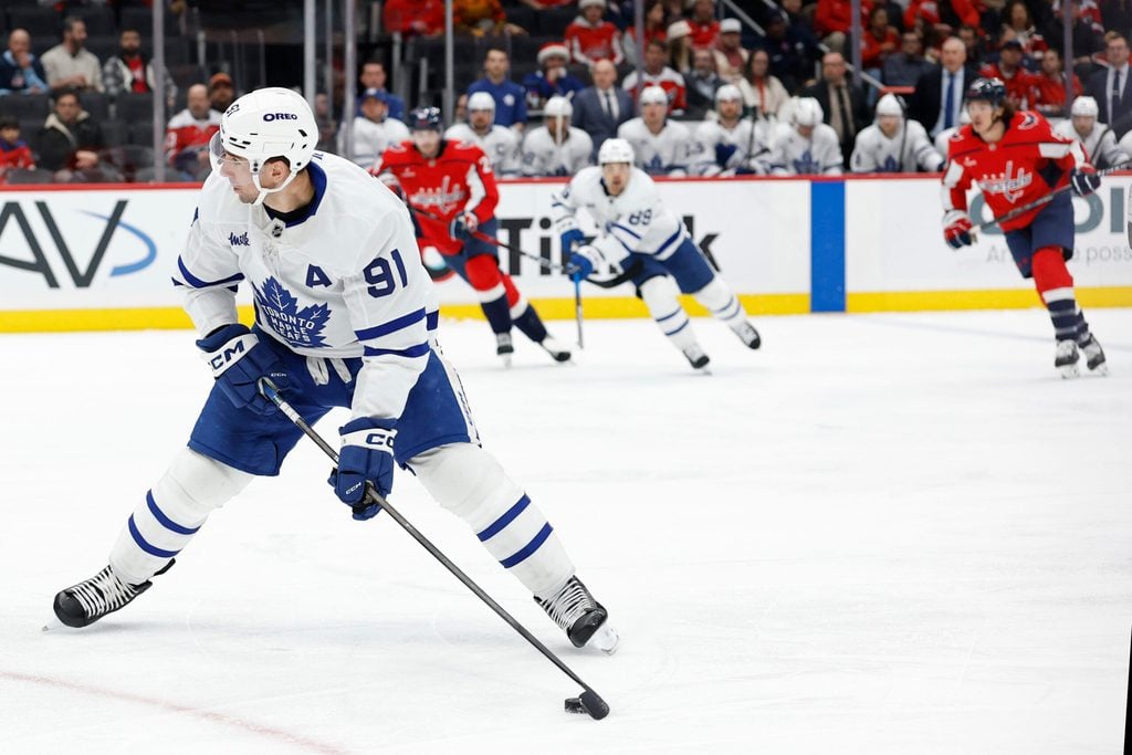 Dec 18, 2025; Washington, District of Columbia, USA; Toronto Maple Leafs center John Tavares (91) prepares to shoot the puck against the Washington Capitals during the second period at Capital One Arena. Mandatory Credit: Geoff Burke-Imagn Images