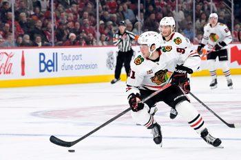 Dec 18, 2025; Montreal, Quebec, CAN; Chicago Blackhawks forward Frank Nazar (91) plays the puck during the second period against the Montreal Canadiens at the Bell Centre. Mandatory Credit: Eric Bolte-Imagn Images