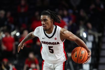 Dec 18, 2025; Athens, Georgia, USA; Georgia Bulldogs guard Jeremiah Wilkinson (5) dribbles against the Western Carolina Catamounts in the second half at Stegeman Coliseum. Mandatory Credit: Mady Mertens-Imagn Images
