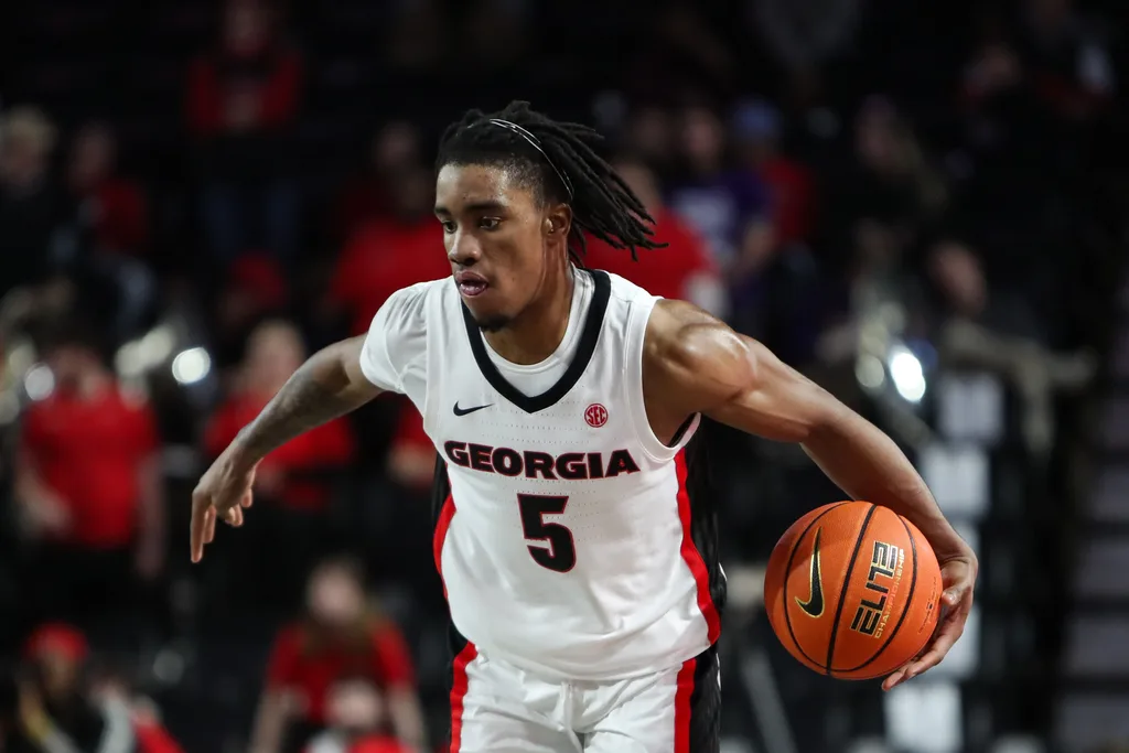 Dec 18, 2025; Athens, Georgia, USA; Georgia Bulldogs guard Jeremiah Wilkinson (5) dribbles against the Western Carolina Catamounts in the second half at Stegeman Coliseum. Mandatory Credit: Mady Mertens-Imagn Images