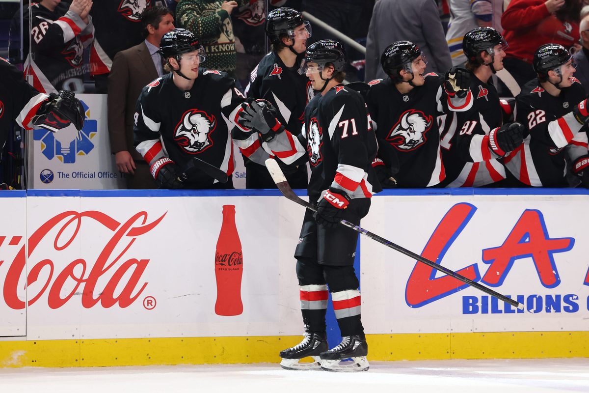 Dec 18, 2025; Buffalo, New York, USA; Buffalo Sabres center Ryan McLeod (71) celebrates his goal with teammates during the third period against the Philadelphia Flyers at KeyBank Center. Mandatory Credit: Timothy T. Ludwig-Imagn Images
