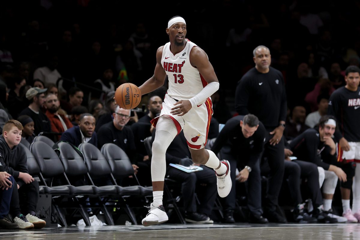 Dec 18, 2025; Brooklyn, New York, USA; Miami Heat center Bam Adebayo (13) brings the ball up court against the Brooklyn Nets during the third quarter at Barclays Center. Mandatory Credit: Brad Penner-Imagn Images