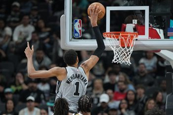 Dec 18, 2025; San Antonio, Texas, USA; San Antonio Spurs forward Victor Wembanyama (1) dunks during the second half against the Washington Wizards at Frost Bank Center. Mandatory Credit: Scott Wachter-Imagn Images