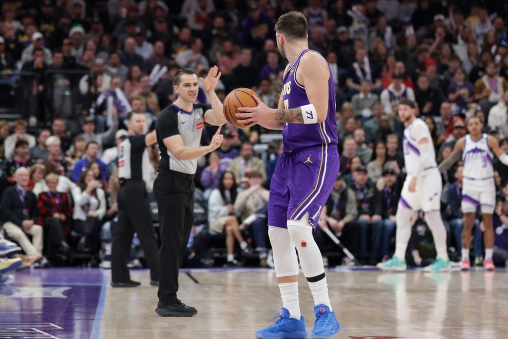 Dec 18, 2025; Salt Lake City, Utah, USA; Los Angeles Lakers forward/guard Luka Doncic (77) is called for a technical foul after spiking the ball during the second half against the Utah Jazz at Delta Center. Mandatory Credit: Chris Nicoll-Imagn Images