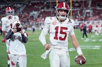 Alabama's Ty Simpson (15) celebrates following the College Football Playoff game between the University of Oklahoma Sooners (OU) and the Alabama Crimson Tide at the Gaylord Family – Oklahoma Memorial Stadium in Norman, Okla., Friday Dec. 19, 2025.