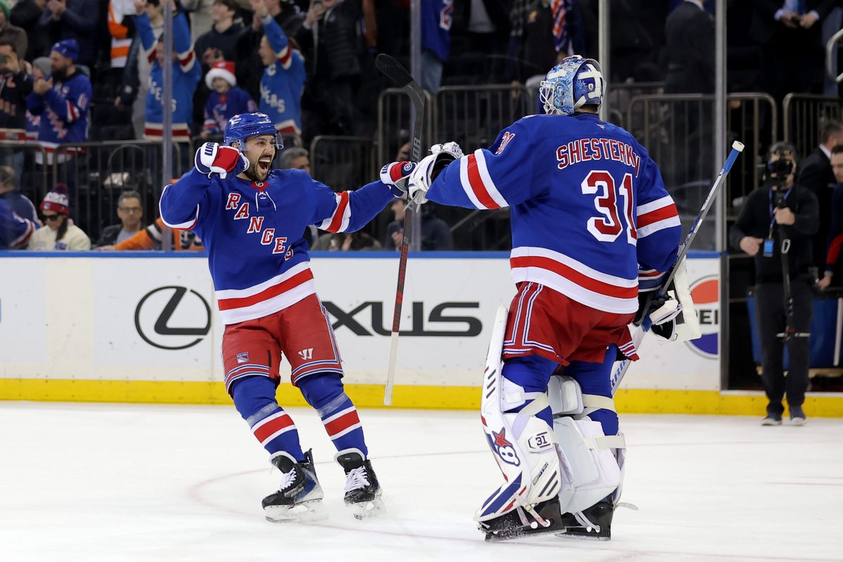 Dec 20, 2025; New York, New York, USA; New York Rangers center Vincent Trocheck (16) celebrates with goaltender Igor Shesterkin (31) after defeating the Philadelphia Flyers in a shootout at Madison Square Garden. Mandatory Credit: Brad Penner-Imagn Images