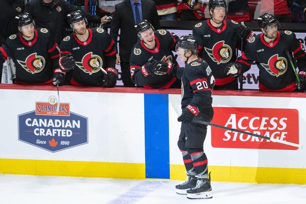 Dec 20, 2025; Ottawa, Ontario, CAN; Ottawa Senators left wing Fabian Zetterlund (20) celebrates with team his goal scored in the third period against the Chicago Blackhawks at the Canadian Tire Centre. Mandatory Credit: Marc DesRosiers-IMAGN Images
