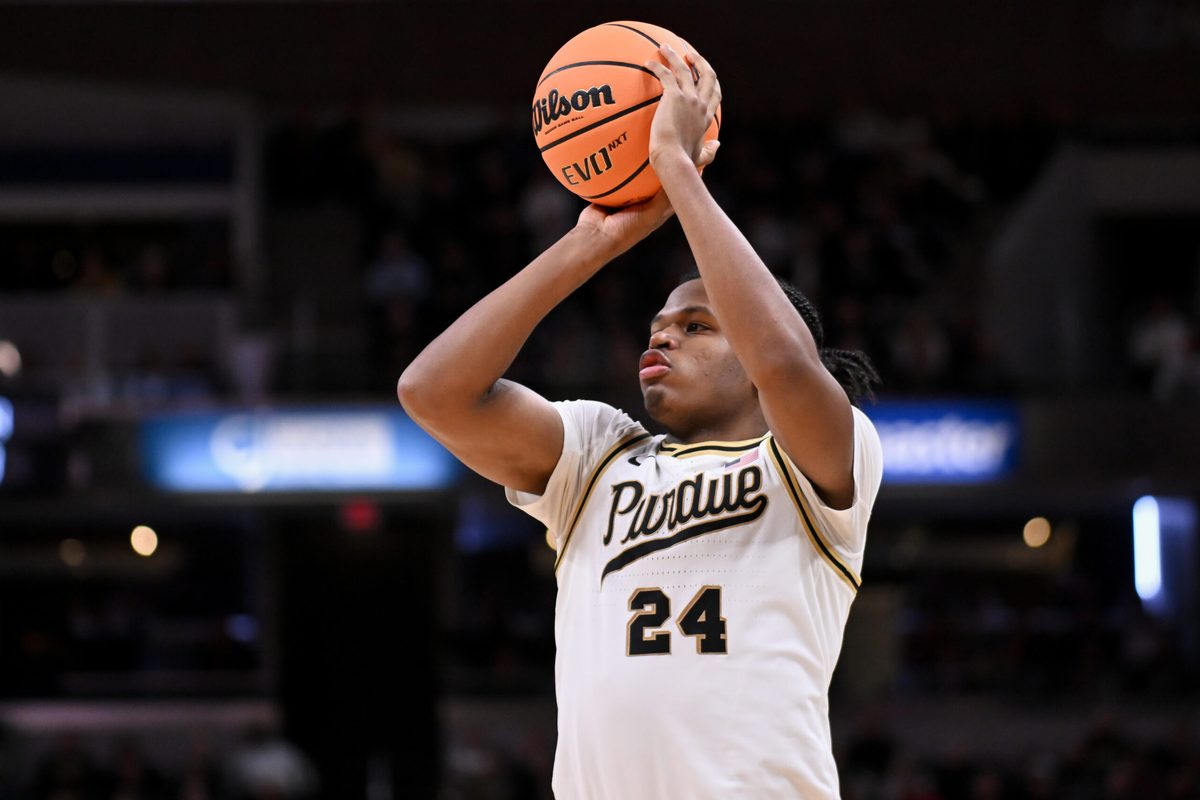 Dec 20, 2025; Indianapolis, Indiana, USA; Purdue Boilermakers guard Gicarri Harris (24) shoots the ball during the second half against the Auburn Tigers at Gainbridge Fieldhouse. Mandatory Credit: Robert Goddin-Imagn Images