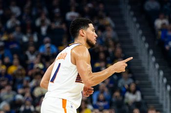 Dec 20, 2025; San Francisco, California, USA; Phoenix Suns guard Devin Booker (1) reacts after he hit a three-point shot against the Golden State Warriors during the first quarter at Chase Center. Mandatory Credit: John Hefti-Imagn Images
