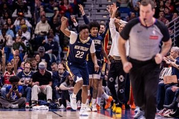 Dec 20, 2025; New Orleans, Louisiana, USA;  New Orleans Pelicans center Derik Queen (22) reacts to making a three point basket against the Indiana Pacers during the second half at Smoothie King Center. Mandatory Credit: Stephen Lew-Imagn Images