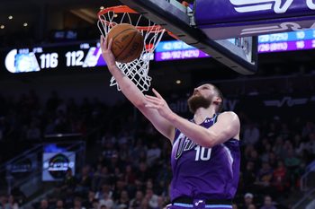 Dec 20, 2025; Salt Lake City, Utah, USA; Utah Jazz guard Svi Mykhailiuk (10) lays the ball up against the Orlando Magic during the second half at Delta Center. Mandatory Credit: Rob Gray-Imagn Images