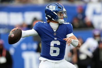 Dec 21, 2025; East Rutherford, New Jersey, USA; New York Giants quarterback Jaxson Dart (6) drops back to pass against the Minnesota Vikings during the second half at MetLife Stadium. Mandatory Credit: Vincent Carchietta-Imagn Images