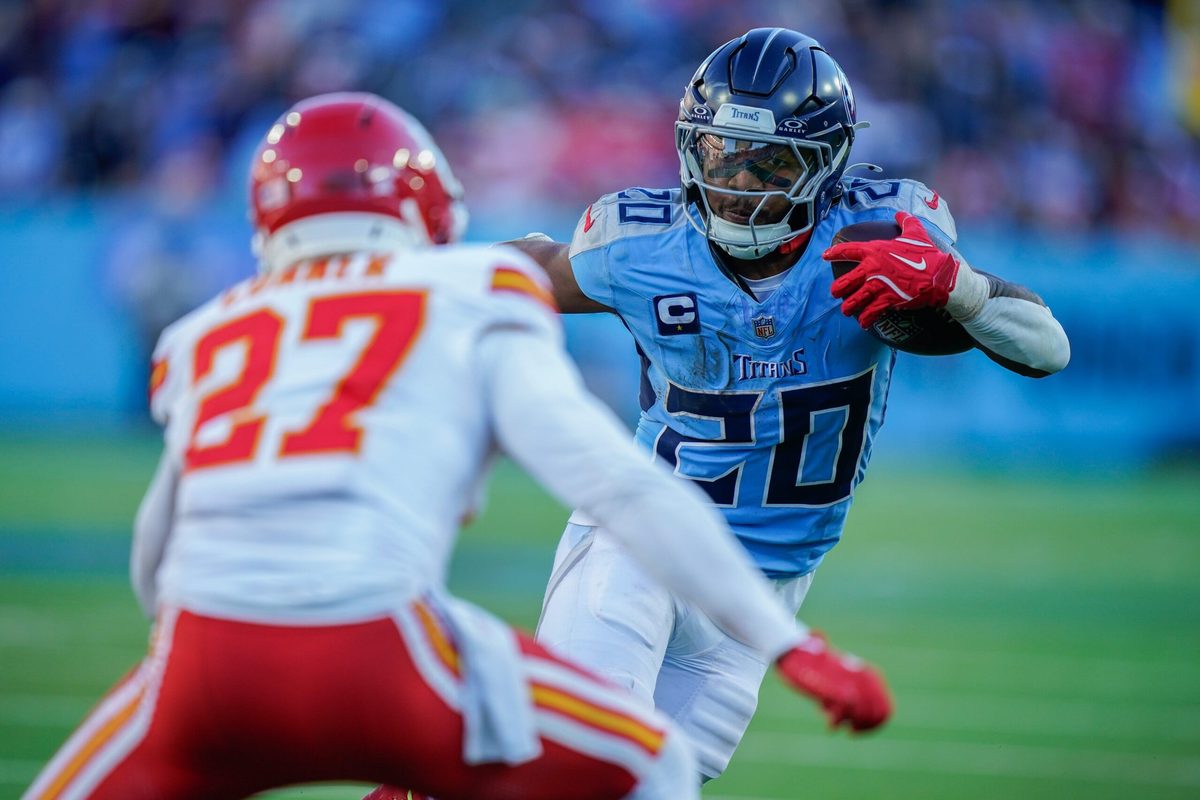 Tennessee Titans running back Tony Pollard (20) runs the ball during the fourth quarter against the Kansas City Chiefs at Nissan Stadium in Nashville, Tenn., Sunday, Dec. 21, 2025.