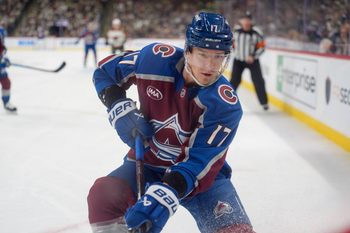 Dec 21, 2025; Saint Paul, Minnesota, USA; Colorado Avalanche center Parker Kelly (17) plays the puck in the corner against the Minnesota Wild in the first period at Grand Casino Arena. Mandatory Credit: Matt Blewett-Imagn Images