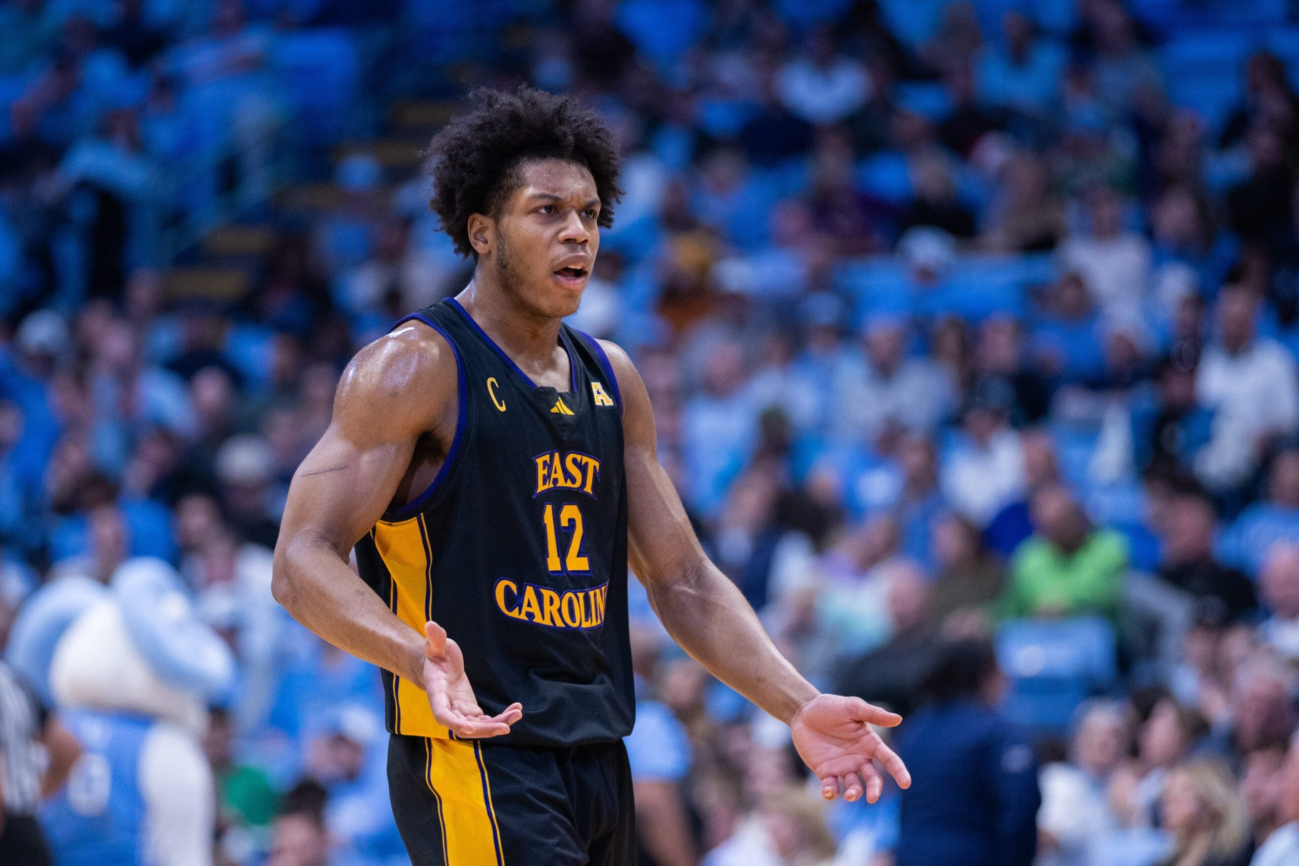 Dec 22, 2025; Chapel Hill, North Carolina, USA; East Carolina Pirates guard Jordan Riley (12) reacts during the second half against the North Carolina Tar Heels at Dean E. Smith Center. Mandatory Credit: Scott Kinser-Imagn Images