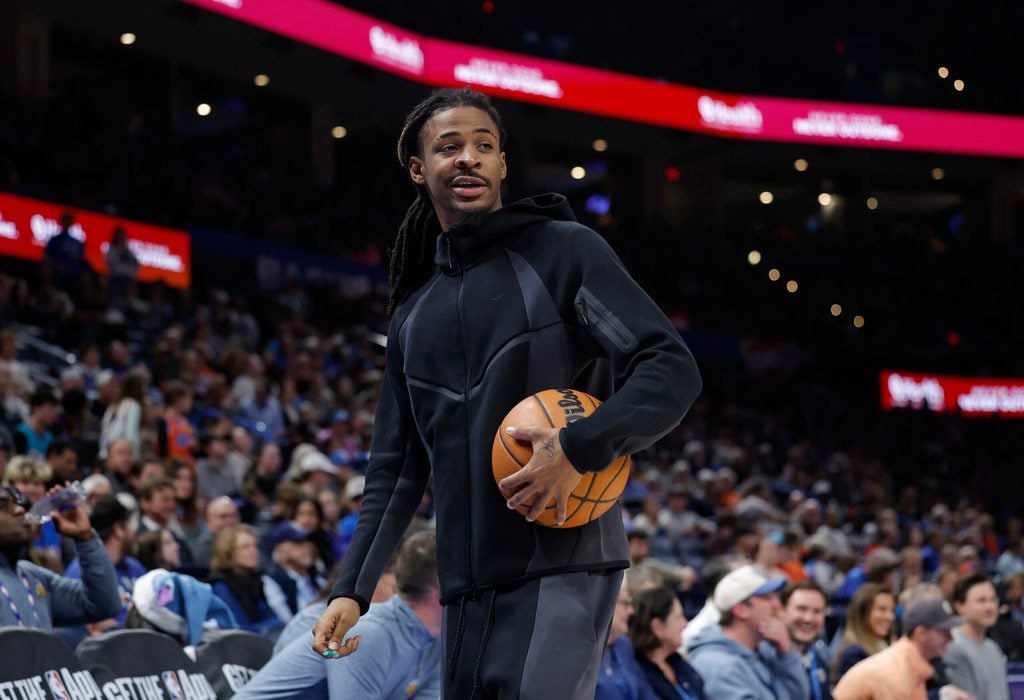 Dec 22, 2025; Oklahoma City, Oklahoma, USA; Memphis Grizzlies guard Ja Morant (12) walks off the court during a time out against the Oklahoma City Thunder during the second half at Paycom Center. Mandatory Credit: Alonzo Adams-Imagn Images