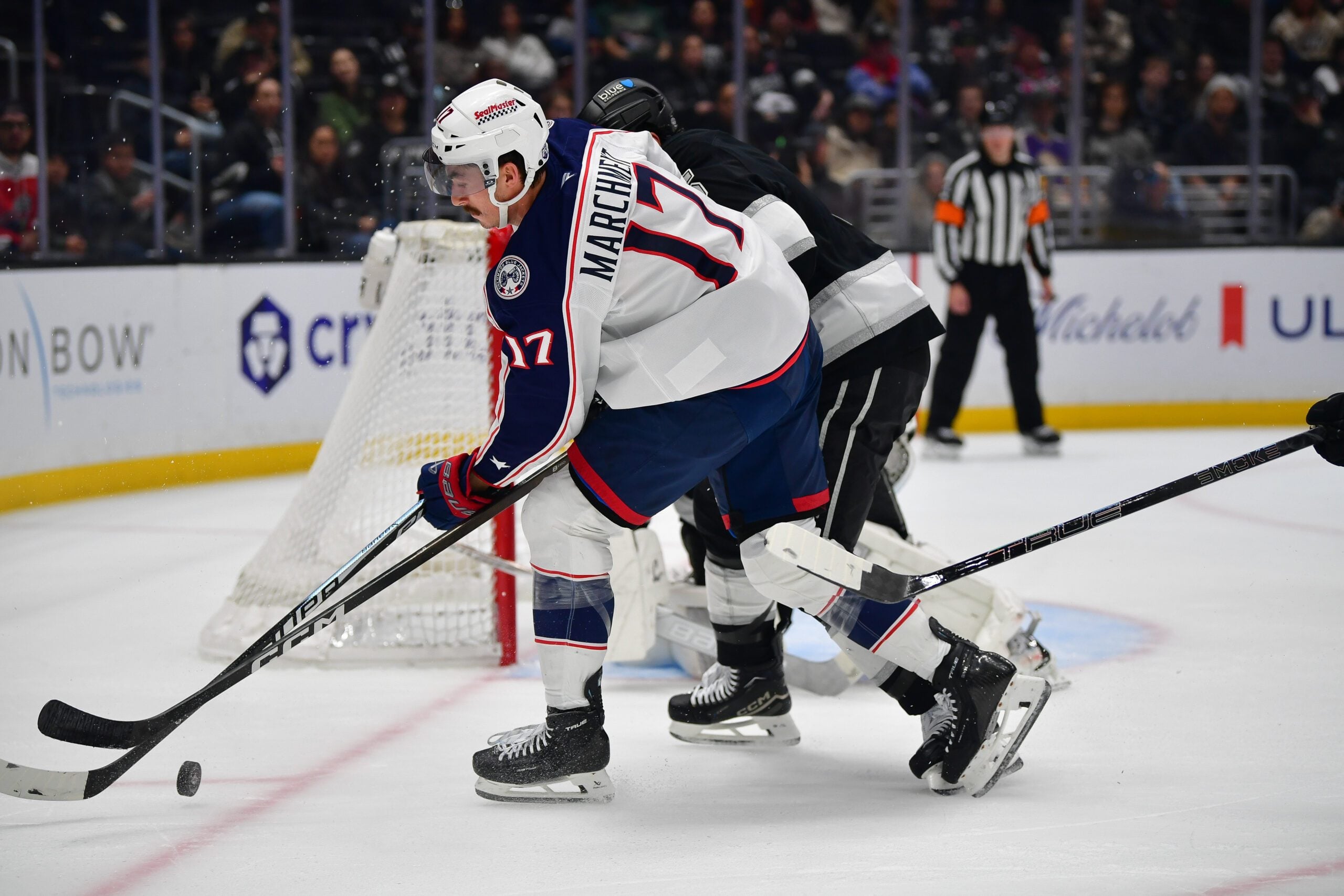 Dec 22, 2025; Los Angeles, California, USA; Columbus Blue Jackets left wing Mason Marchment (17) moves the puck against the Los Angeles Kings during the third period at Crypto.com Arena. Mandatory Credit: Gary A. Vasquez-Imagn Images