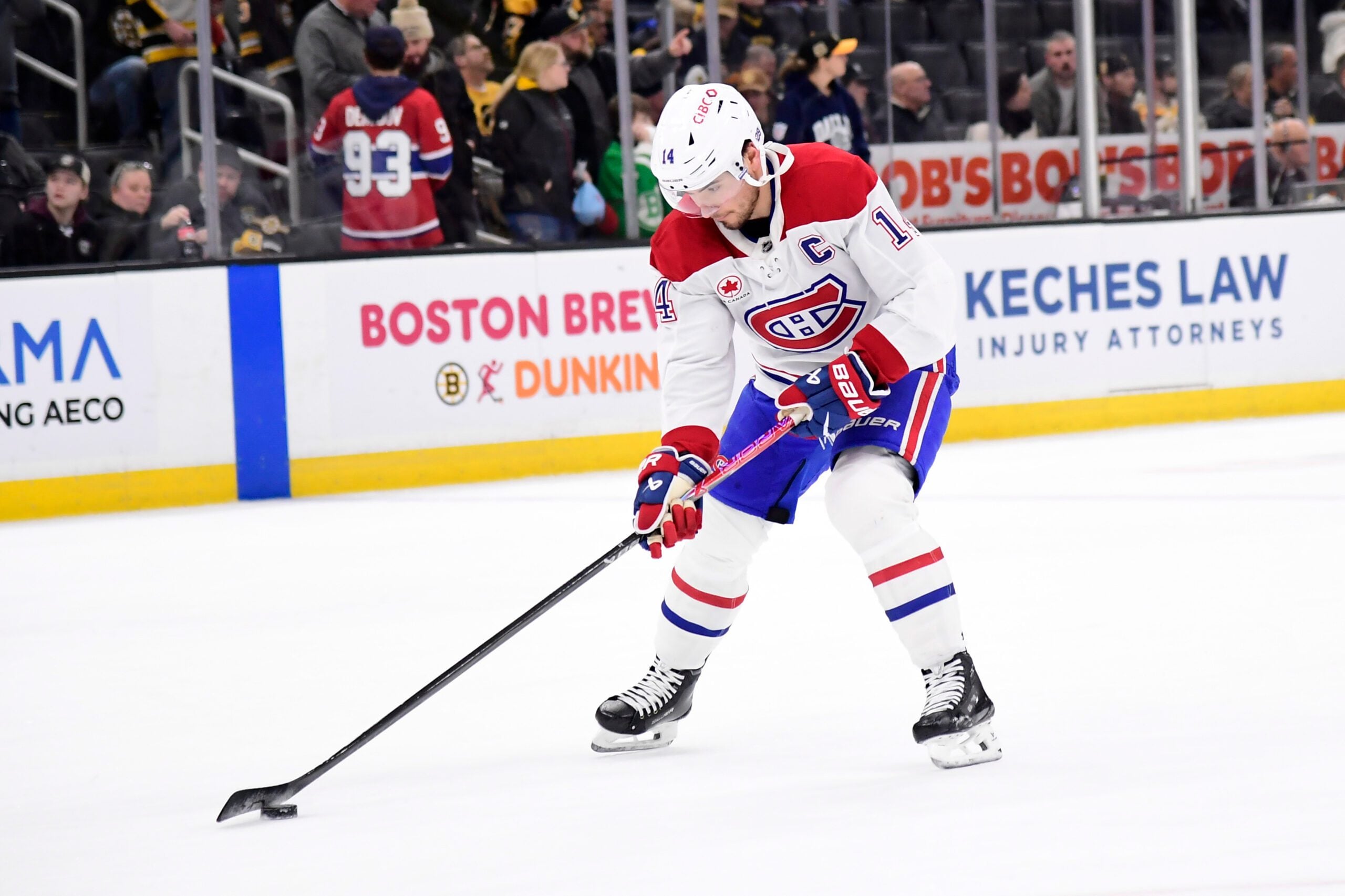 Dec 23, 2025; Boston, Massachusetts, USA; Montréal Canadiens center Nick Suzuki (14) stickhandles with the puck prior to a game against the Boston Bruins at TD Garden. Mandatory Credit: Bob DeChiara-Imagn Images