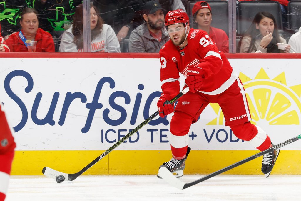 Dec 23, 2025; Detroit, Michigan, USA; Detroit Red Wings right wing Alex Debrincat (93) skates with the puck in the third period against the Dallas Stars at Little Caesars Arena. Mandatory Credit: Rick Osentoski-Imagn Images