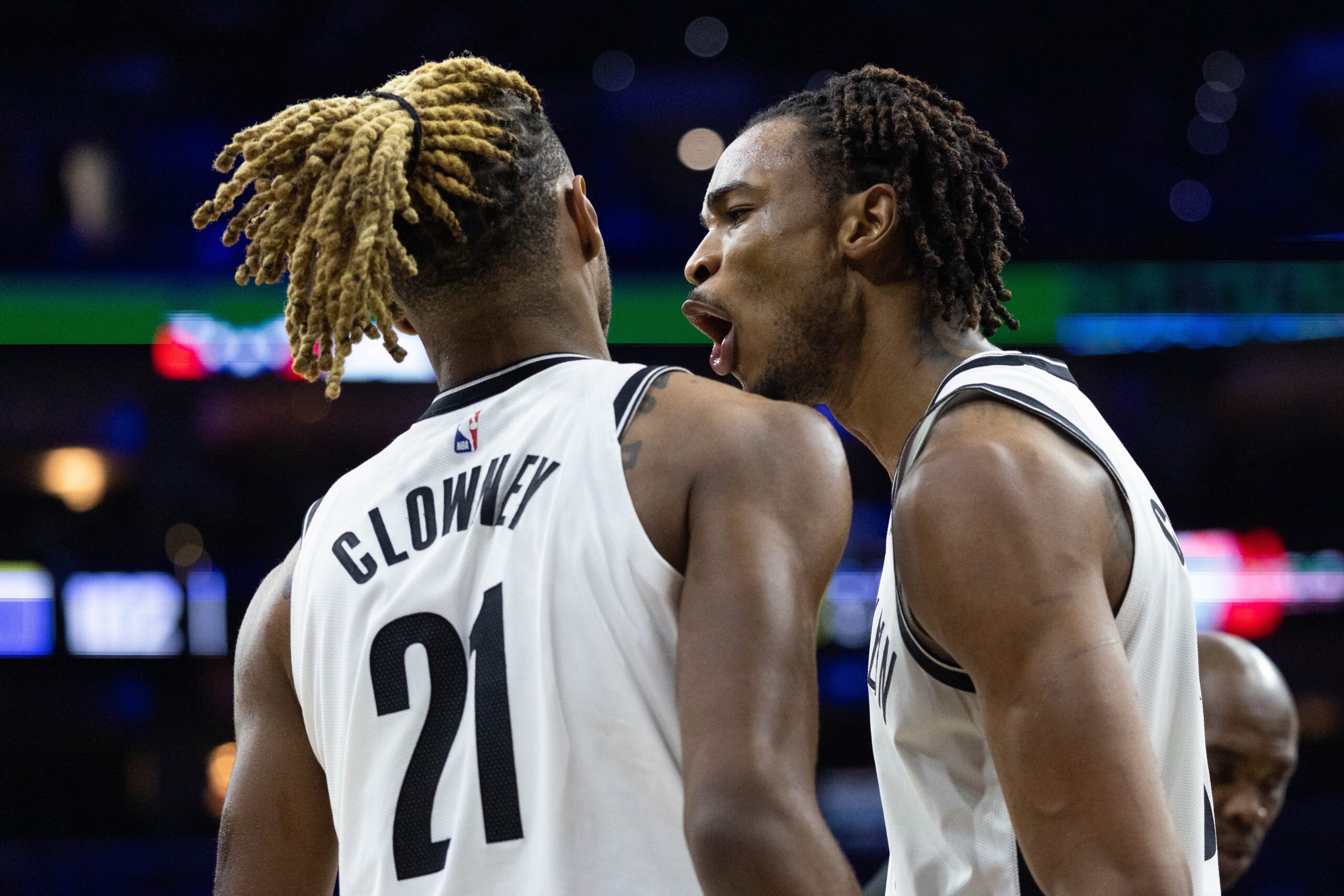 Dec 23, 2025; Philadelphia, Pennsylvania, USA; Brooklyn Nets center Nic Claxton (33) reacts with forward Noah Clowney (21) after a defensive stop against the Philadelphia 76ers during the fourth quarter at Xfinity Mobile Arena. Mandatory Credit: Bill Streicher-Imagn Images