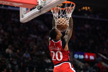 Dec 23, 2025; Inglewood, California, USA;  Los Angeles Clippers forward John Collins (20) dunks the ball during the first half against the Houston Rockets at Intuit Dome. Mandatory Credit: Kiyoshi Mio-Imagn Images