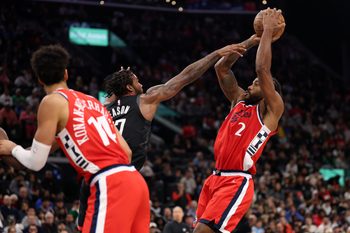 Dec 23, 2025; Inglewood, California, USA;  Los Angeles Clippers forward Kawhi Leonard (2) shoots the ball over Houston Rockets forward Tari Eason (17) during the first half at Intuit Dome. Mandatory Credit: Kiyoshi Mio-Imagn Images