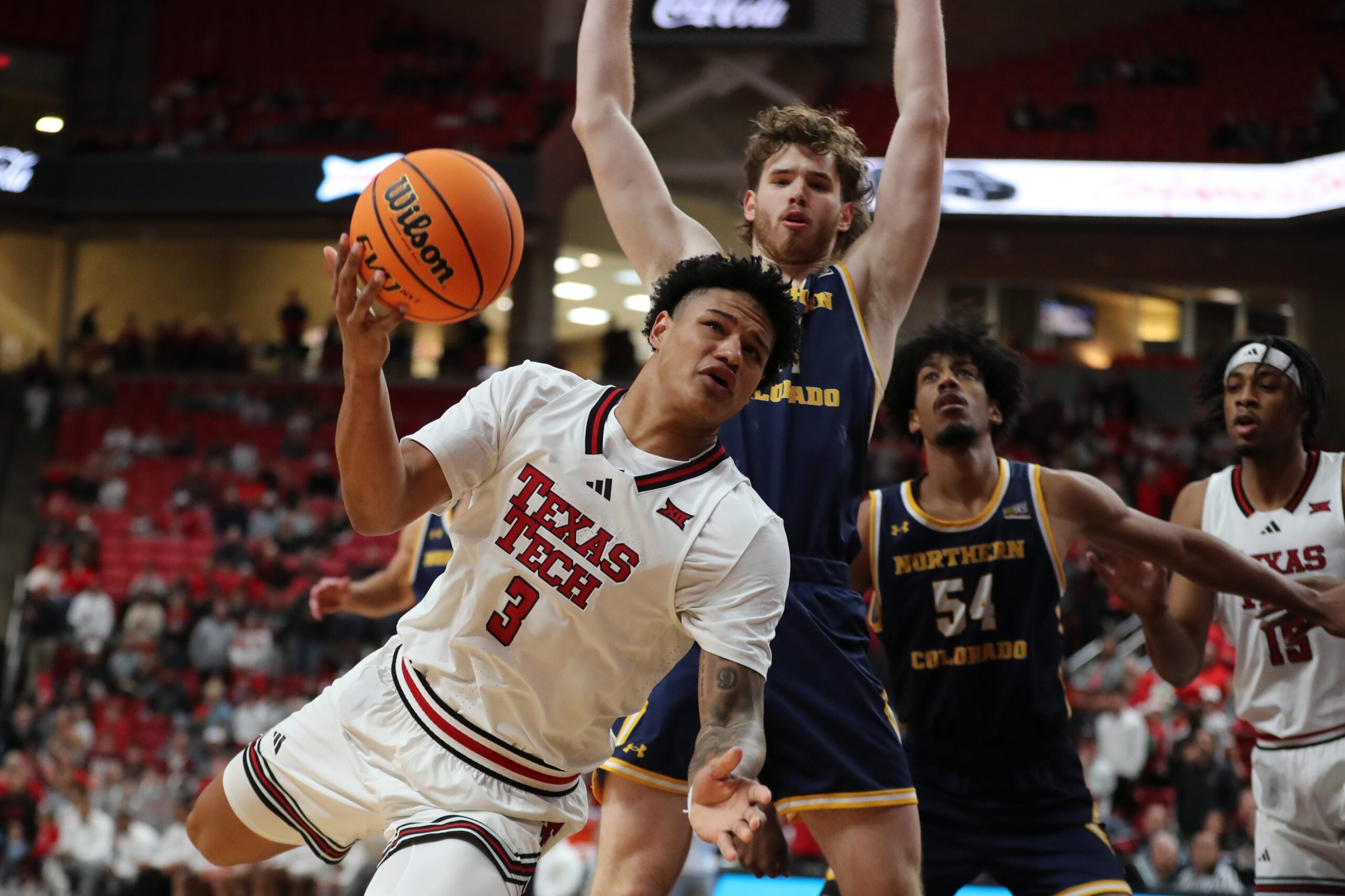 Dec 16, 2025; Lubbock, Texas, USA;  Texas Tech Red Raiders forward LeJuan Watts (3) falls in the first half against the Northern Colorado Bears at United Supermarkets Arena. Mandatory Credit: Michael C. Johnson-Imagn Images