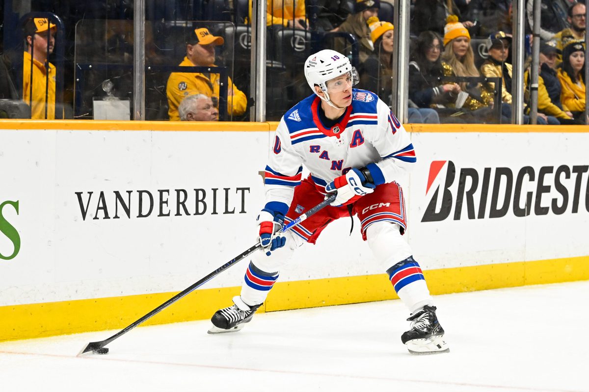 Dec 21, 2025; Nashville, Tennessee, USA;  New York Rangers left wing Artemi Panarin (10) skates behind the net against the Nashville Predators during the second period at Bridgestone Arena. Mandatory Credit: Steve Roberts-Imagn Images