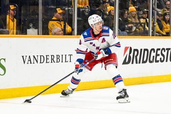 Dec 21, 2025; Nashville, Tennessee, USA;  New York Rangers left wing Artemi Panarin (10) skates behind the net against the Nashville Predators during the second period at Bridgestone Arena. Mandatory Credit: Steve Roberts-Imagn Images